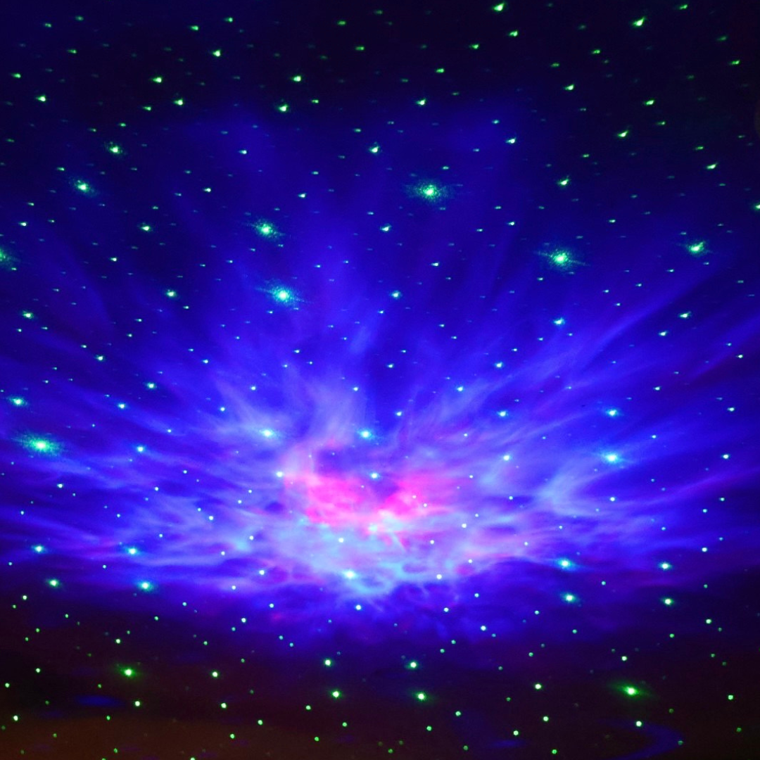 ufo galaxy projector illuminanting a room with blue galaxy lights