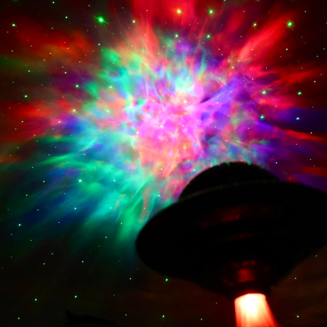 ufo galaxy projector  illuminating a room with galaxy lights